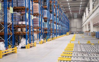 logistica warehouse-storage-interior-with-shelves-loaded-with-goods.jpg